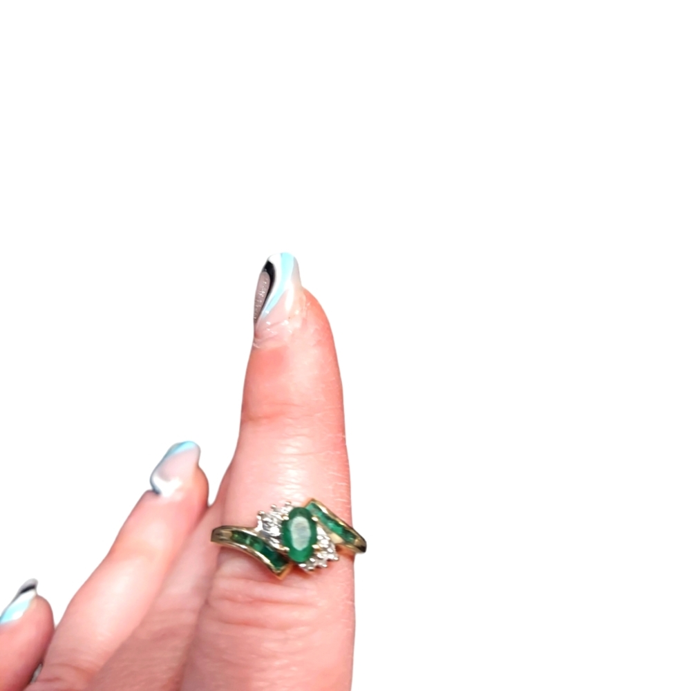 Womens emerald and diamond ring